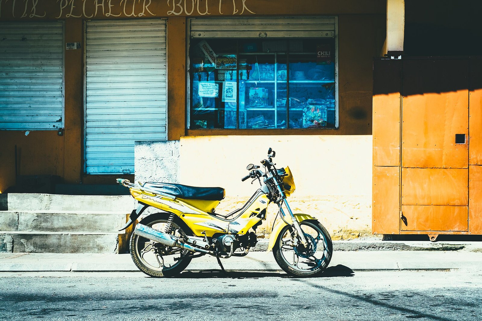 Yellow motorcycle parked